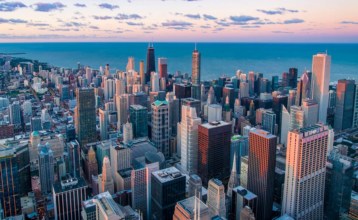 Aerial view of a global city skyline at dusk — the markets your brand can reach